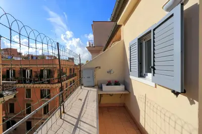 a balcony with a sink on the side of a building at Monti charming apartment - Rome short let Service in Rome