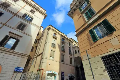 two tall buildings next to each other at Monti charming apartment - Rome short let Service in Rome