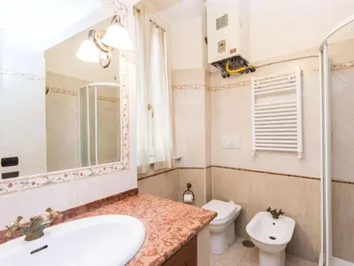 a bathroom with a sink and a toilet at Apartment Domus Fori by Interhome in Rome