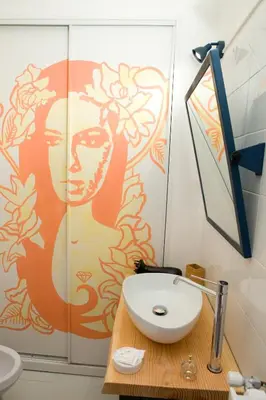 a bathroom with a sink and a mirror at Private Modern Studio Paolina City Center in Rome