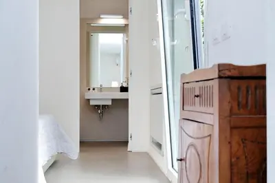 a bathroom with a sink and a mirror at Piazza del Popolo Apartment in Rome