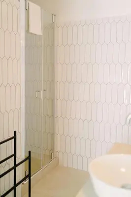 a bathroom with a shower and a sink at Royal Suite du Vatican in Rome