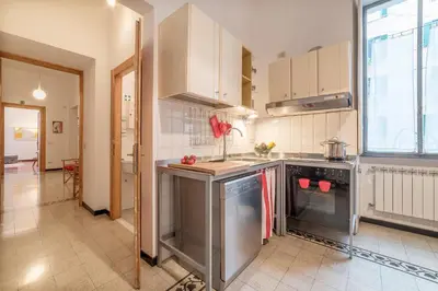 a kitchen with a sink and a dishwasher at Elizabeth House - WelcomeToRhome in Rome