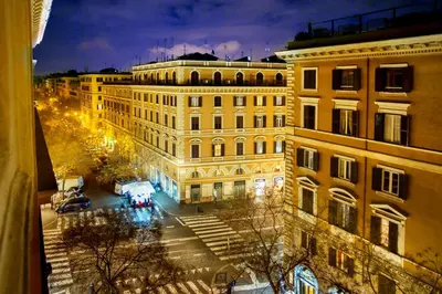 a view of a large building at night at Ottaviano Guest House in Rome
