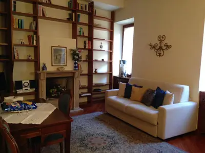 a living room with a couch and a table at A CASA DI ZIA LOLA in Rome