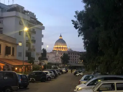 a view of the capitol building with cars parked on a street at Studio Flat Vaticano in Rome