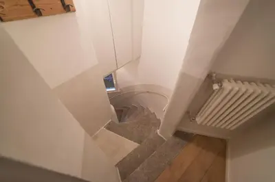 an overhead view of a stairs with a radiator at GuestHost - Piazza Venezia&Colosseum Loft in Rome