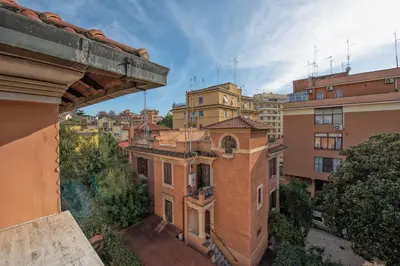 a view of an apartment building from a balcony at A Vinicius et Mita in Rome