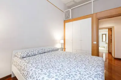 a bedroom with a large bed in a room at Casa Vacanze Risorgimento in Rome