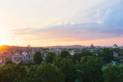 a view of a city at sunset at Toberto Apartment in Rome