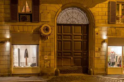 an entrance to a building with a large wooden door at Navona Blue Apartment in Rome