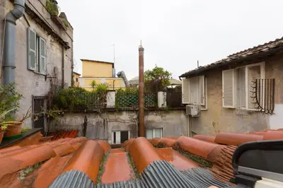 a view of some red roofs of some buildings at Pantheon Romantic Loft in Rome