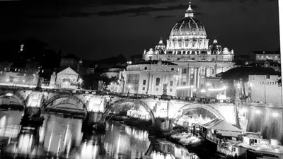 a black and white photo of a bridge and a building at Domus Angelica in Rome