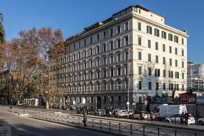 a large white building on the side of a street at Dulcis In Fundo b&b in Rome