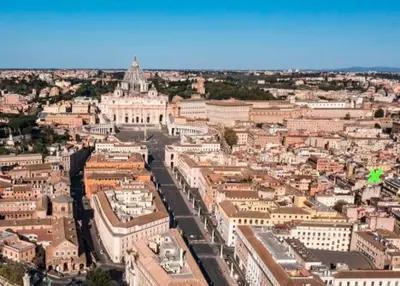 an aerial view of a city with a building at Borgo Pio San Pietro Apartment in Rome
