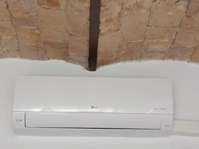 a room with a ceiling with a brick wall at Borgo Pio San Pietro Apartment in Rome