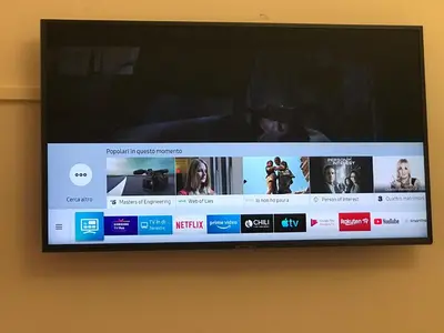 a television screen with a bunch of videos on it at affittacamere sereno in Rome