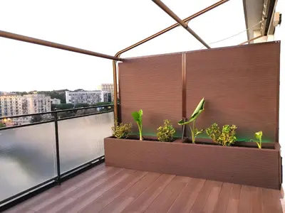 a balcony with plants on it with a view at Giglio Luxury Apartment - Romantic Jacuzzi in Rome