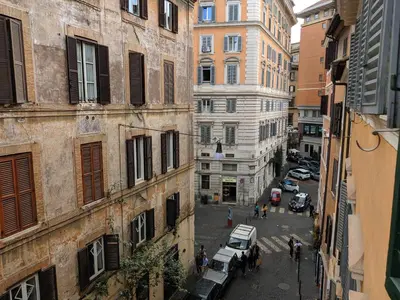 an overhead view of a city street with buildings at Urbana Coliseum House in Rome