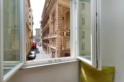 an open window with a view of a building at Raffaello Charmsuite in Rome