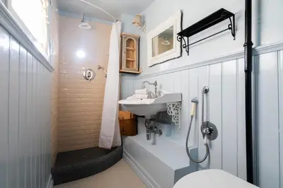 a bathroom with a sink and a toilet and a shower at Scala Lovely Terrace Apartment in Rome