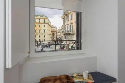 a window with a view of a city at Maison Ottavia in Rome