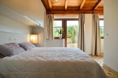 a bedroom with a large bed and a window at St. Petrus et Aurelia in Rome