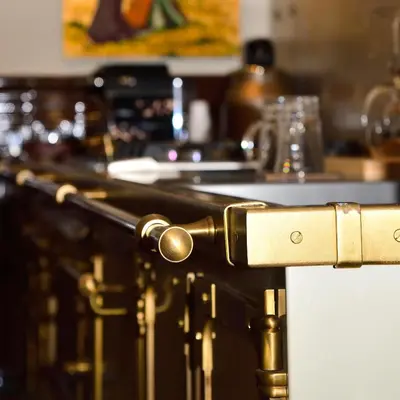 a bar with a black and gold counter top at Regal House Roma Navigatori 23 in Rome