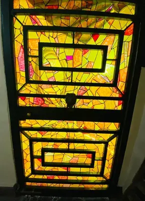 a stained glass window on a wall at Ancient Roman Mansion in Rome