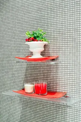 a shelf with a plant and a bowl on a wall at Rome in your heart - Spagna Single Room in Rome