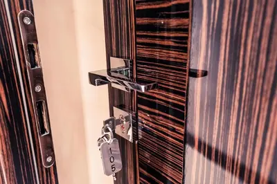 a wooden door with a lock on it at Maison Candia Luxury House in Rome