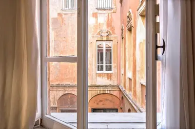 an open window with a view of a building at Casa Coronari Holidays in Rome