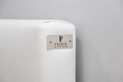 a white refrigerator with a sign that says r particle accelerator at Opera Private Suites by Premium Suites Collection in Rome