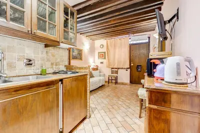 a kitchen with a sink and a counter top at Colosseum Rione Monti 1 in Rome