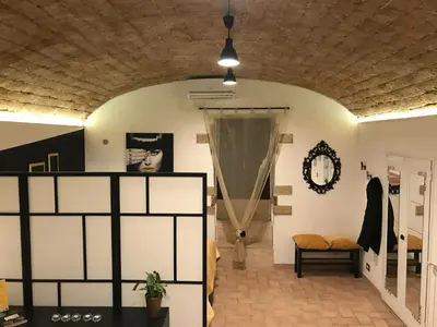 a room with white walls and a ceiling at CasAphrodite in Rome