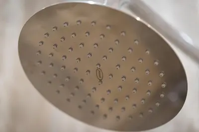 a metal strainer in a white sink at Clementi Portrait in Rome