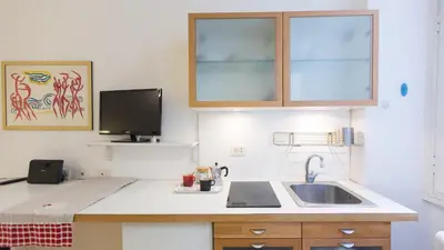 a kitchen with a sink and a counter top at Rental in Rome Pompeo Magno in Rome