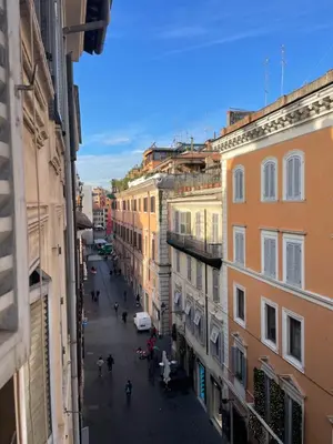 a view of a street in a city with buildings at Frattina 57 in Rome