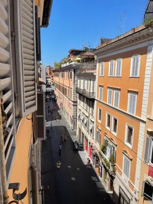 a view of a street in a city with buildings at Frattina 57 in Rome