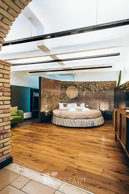 a bedroom with a bed in the middle of a room at Restart Accommodations Ada in Rome