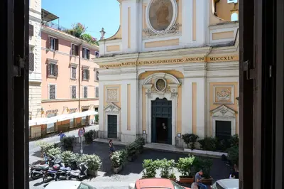 a view of a church with motorcycles parked in front of it at GuestHouse o Affittacamere Magenta Baylon Suite B in Rome