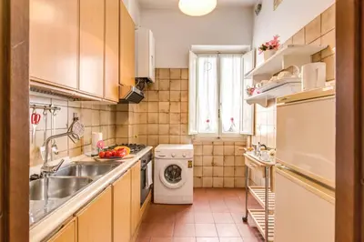 a small kitchen with a sink and a dishwasher at Finally in Rome in Rome