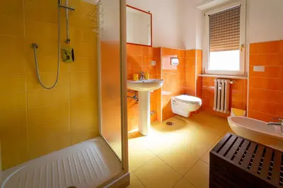 a bathroom with a shower and a sink and a toilet at Difronte Ai Musei Vaticani in Rome