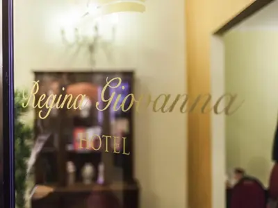 a sign that reads lasagna fonda hotel at Hotel Regina Giovanna in Rome
