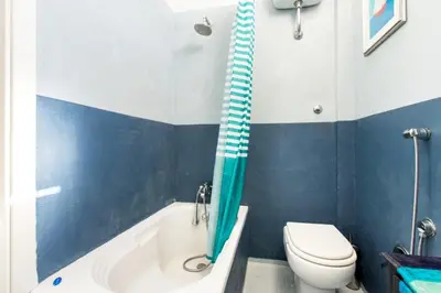 a bathroom with a white toilet and a tub and a toilet at Rome Top floor with Terrace in Rome
