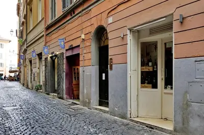 a cobblestone street in front of a building at Pellegrino in Rome