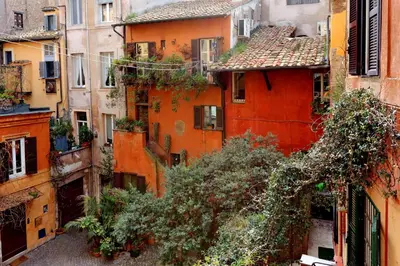 a view of an alley in a city with buildings at Pellegrino in Rome