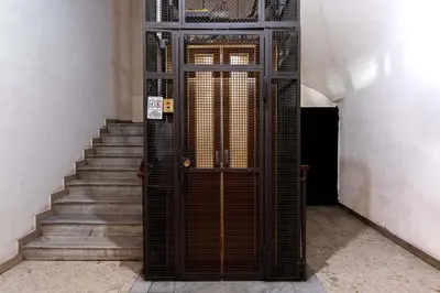 a door leading up to a staircase with a set of stairs at Casa Linnea in Rome