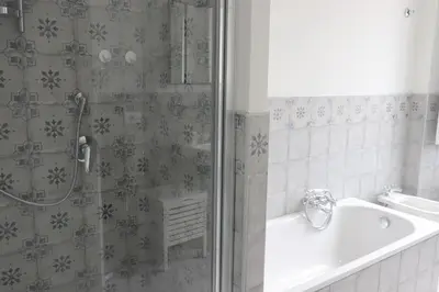 a bathroom with a shower and a sink at Trevi Grand Blu Suite B&B in Rome