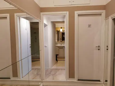 a hallway with sliding glass doors in a house at 109 SUITES ROMA in Rome